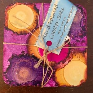 Hand painted coaster set of 4 with rubber bumpers on back.